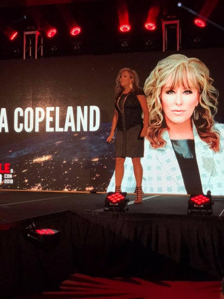 Lisa Copeland speaking on stage, image 1